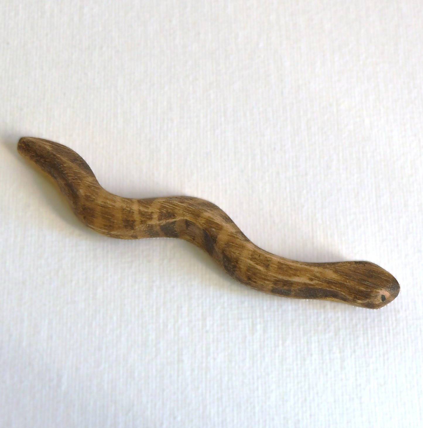Waldorf/Steiner inspired wooden tiger snake toy handcrafted in Australia from Tasmanian oak with certified toy-safe wood stains and natural oil sealer.