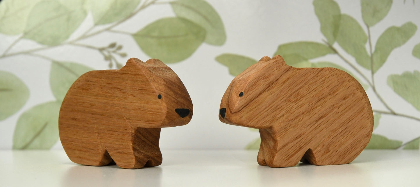 Two wooden wombat toys handcrafted in Australia from Tasmanian oak with certified toy-safe wood stains and natural oil sealer.