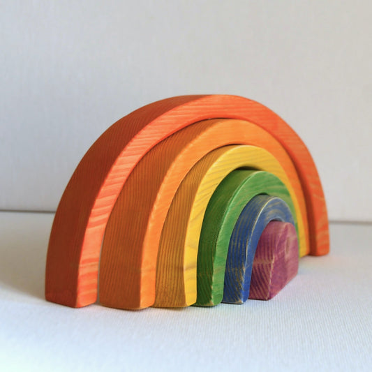 Waldorf inspired wooden rainbow stacking toy handcrafted in Australia from Tasmanian hardwood with certified toy-safe wood stains and natural oil sealer.
