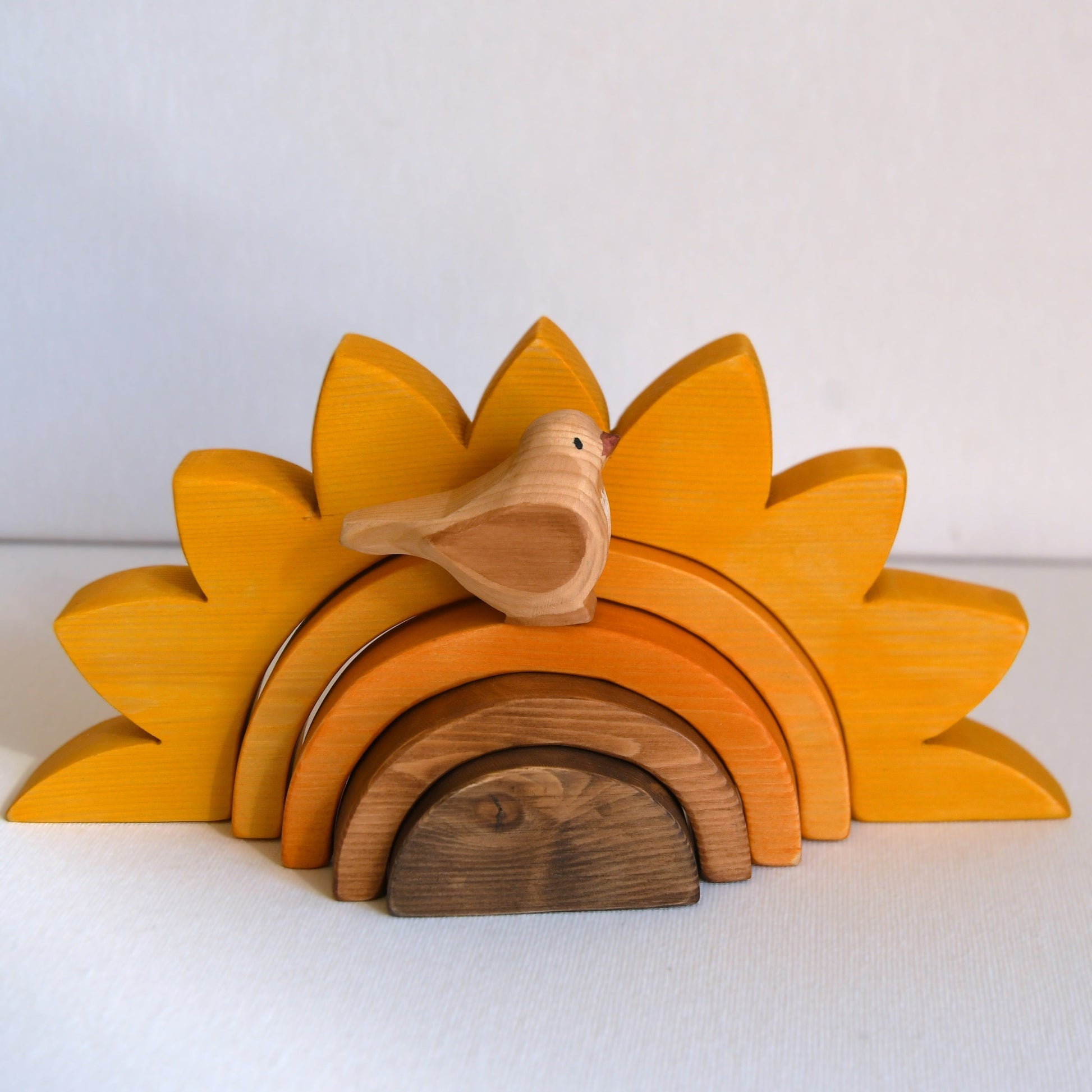 Waldorf inspired wooden sunflower stacking toy handcrafted in Australia from Tasmanian hardwood with certified toy-safe wood stains and natural oil sealer.