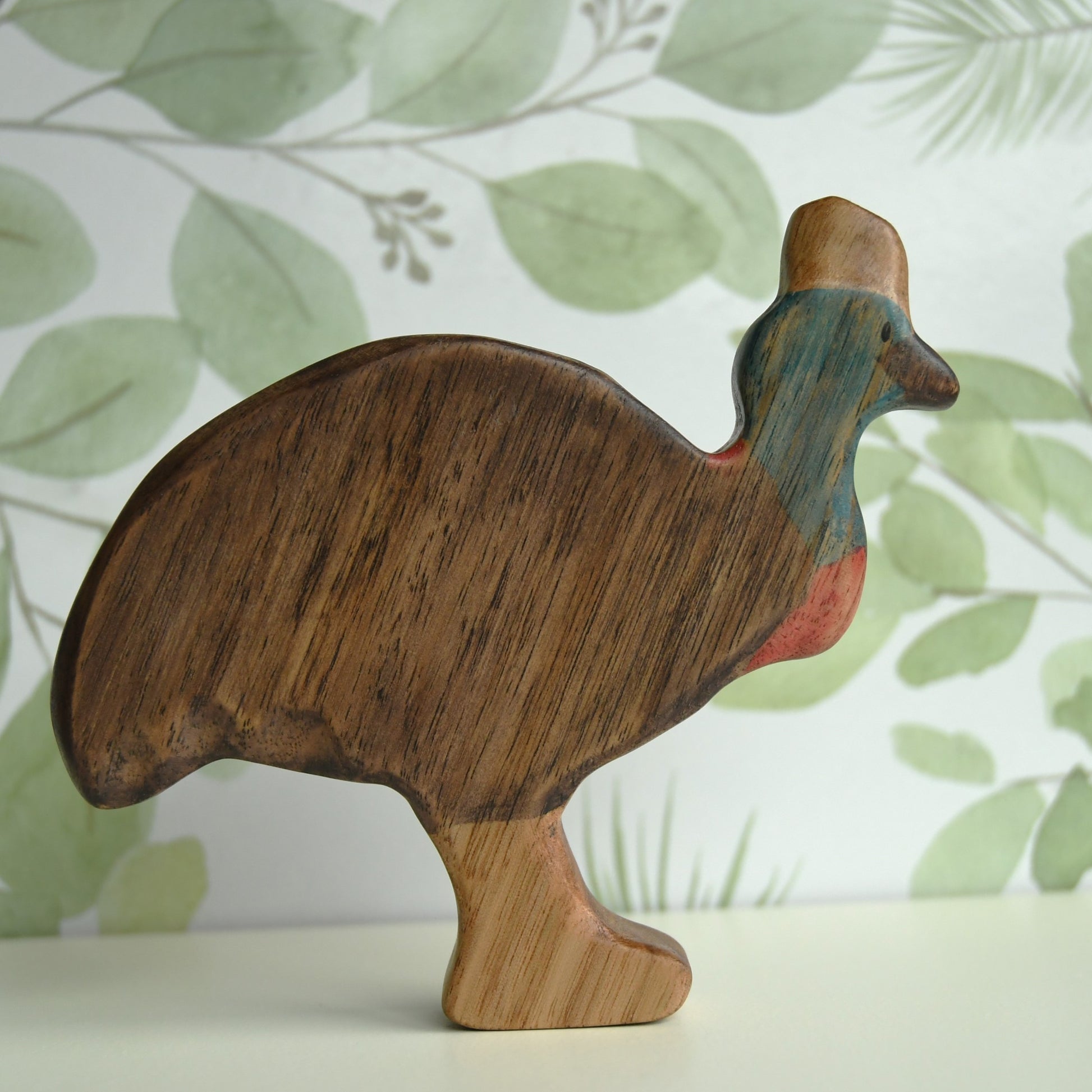 Waldorf inspired wooden cassowary toy handcrafted in Australia from Tasmanian oak with certified toy-safe wood stains and natural oil sealer.