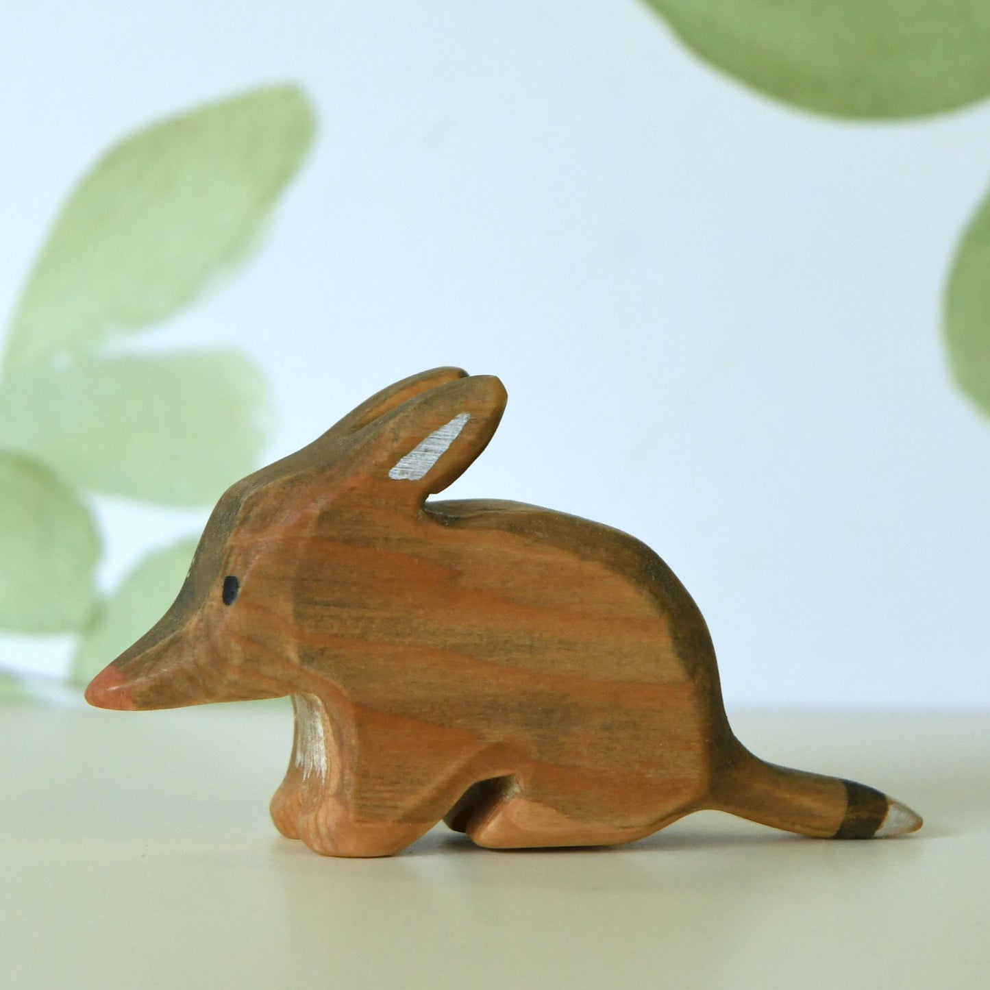 Waldorf inspired wooden bilby toy handcrafted in Australia from Tasmanian hardwood with certified toy-safe wood stains and natural oil sealer.