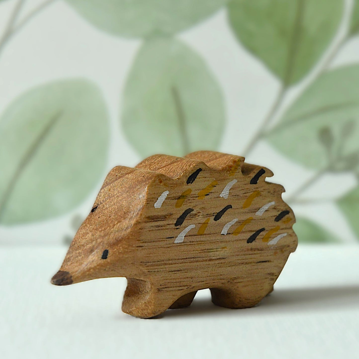 Waldorf inspired wooden echidna toy handcrafted in Australia from Tasmanian oak with certified toy-safe wood stains and natural oil sealer.