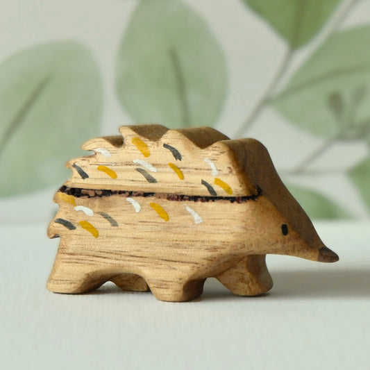 Waldorf inspired wooden echidna toy handcrafted in Australia from Tasmanian oak with certified toy-safe wood stains and natural oil sealer.