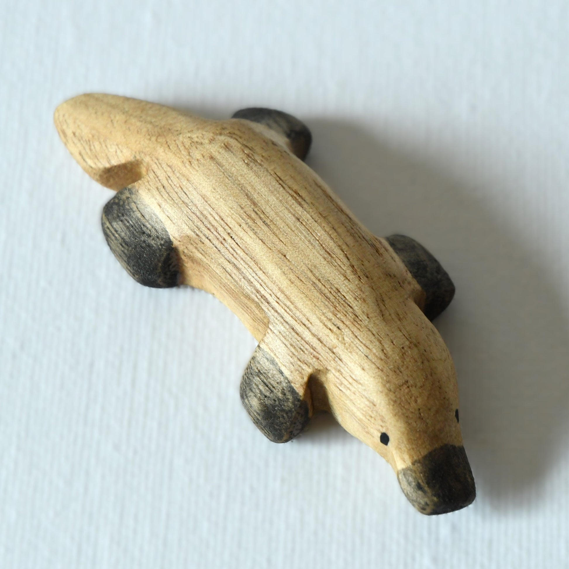 Waldorf inspired wooden platypus toy handcrafted in Australia from Tasmanian oak with certified toy-safe wood stains and natural oil sealer.