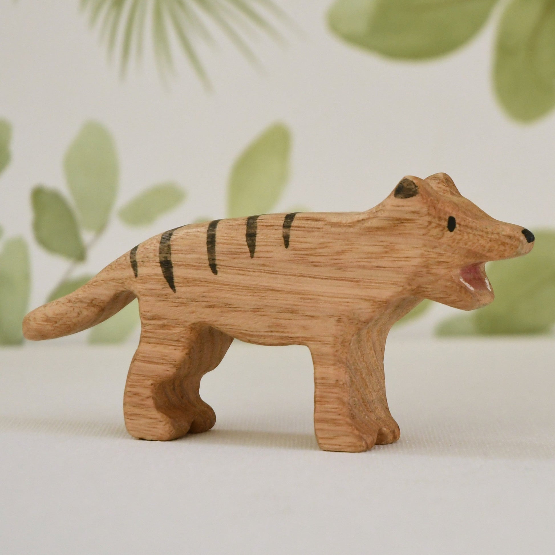 Waldorf/Steiner inspired wooden thylacine Tasmanian tiger toy handcrafted in Australia from Tasmanian oak with certified toy-safe wood stains and natural oil sealer.
