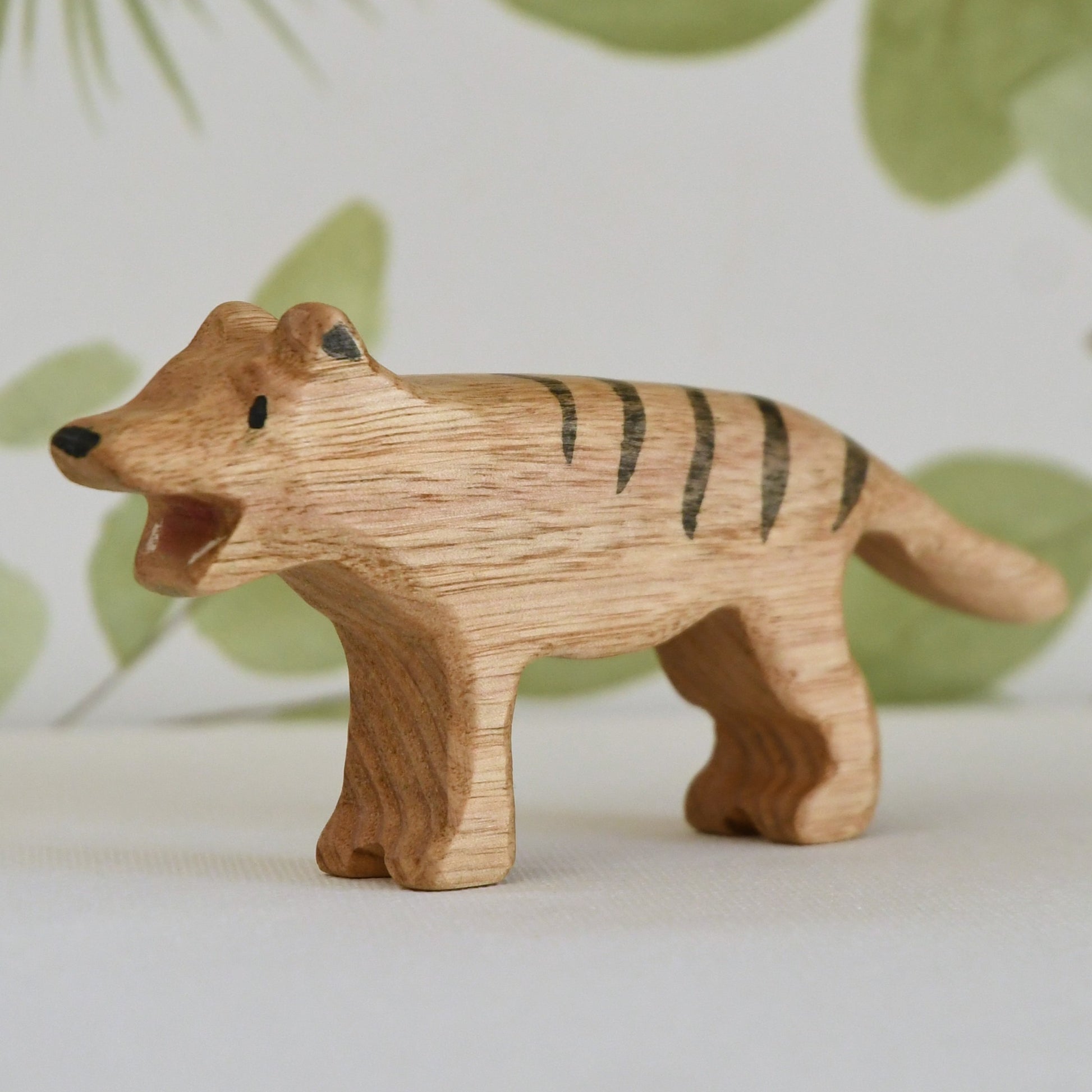 Waldorf/Steiner inspired wooden thylacine Tasmanian tiger toy handcrafted in Australia from Tasmanian oak with certified toy-safe wood stains and natural oil sealer.