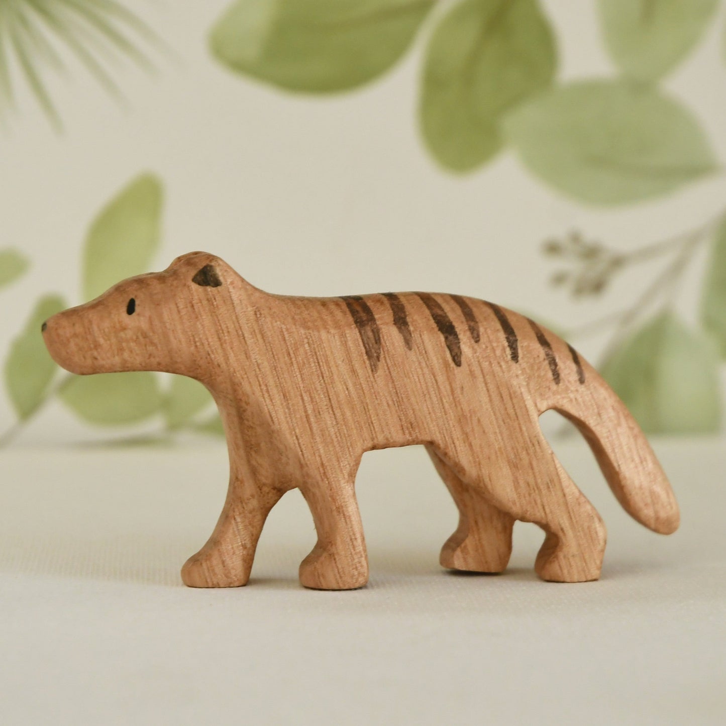 Waldorf/Steiner inspired wooden thylacine Tasmanian tiger toy handcrafted in Australia from Tasmanian oak with certified toy-safe wood stains and natural oil sealer.