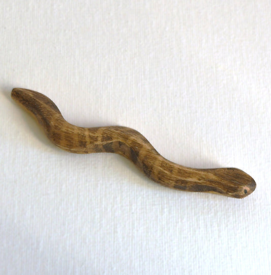 Waldorf/Steiner inspired wooden tiger snake toy handcrafted in Australia from Tasmanian oak with certified toy-safe wood stains and natural oil sealer.
