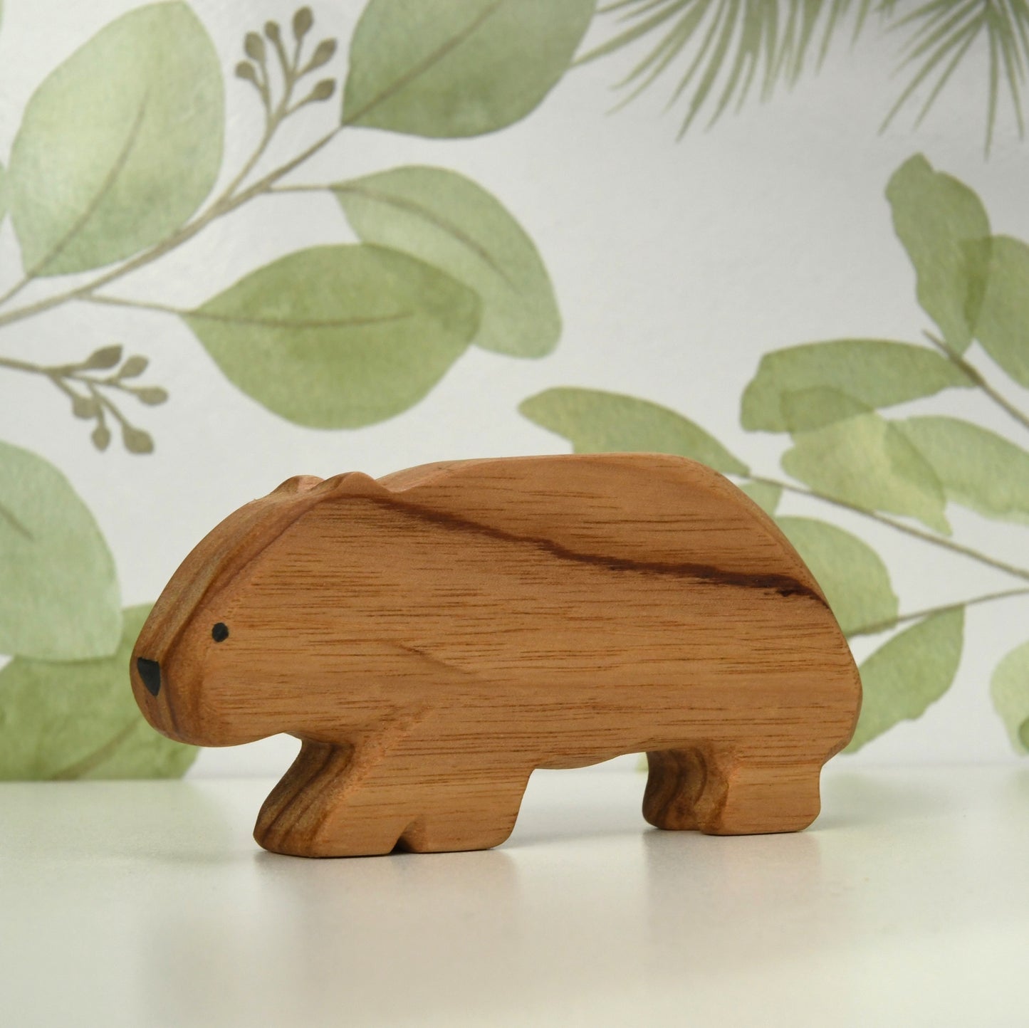 Waldorf inspired wooden wombat toy handcrafted in Australia from Tasmanian oak with certified toy-safe wood stains and natural oil sealer.